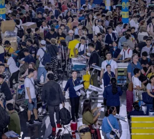 Long queues of passengers form at the check-in counters in Manila, Philippines, due to a July 19 computer outage caused by cybersecurity firm CrowdStrike. Ezra Acayan/Getty Images